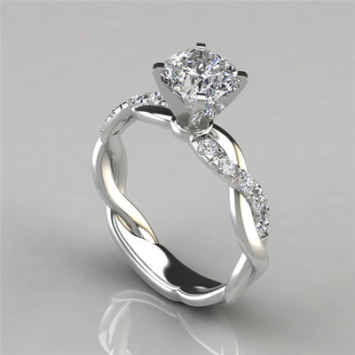 Cross twist diamond ring