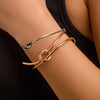 Double layered hollow knot opening bracelet for women