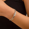 Double layered hollow knot opening bracelet for women