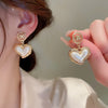 Pearl heart spicy girl earrings