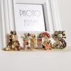 Fashionable pearl letters brooches and safety pins