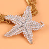 Five pointed star brooch