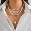 Circular pearl pendant necklace