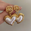 Pearl heart spicy girl earrings