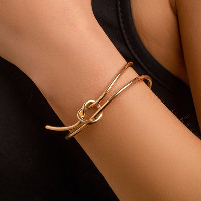 Double layered hollow knot opening bracelet for women