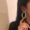 Oval hollow earrings