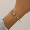 Double layered hollow knot opening bracelet for women