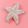 Five pointed star brooch