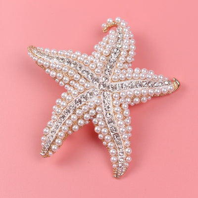 Five pointed star brooch